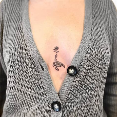 between boobs tattoo|The Ultimate Guide to Sternum Tattoos: Design Ideas and .